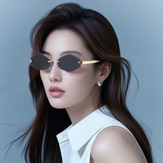 European and American fashion personality small-frame triangular cat-eye sunglasses for men and women, trendy internet celebrity street style metal rimless cut-edge sunglasses