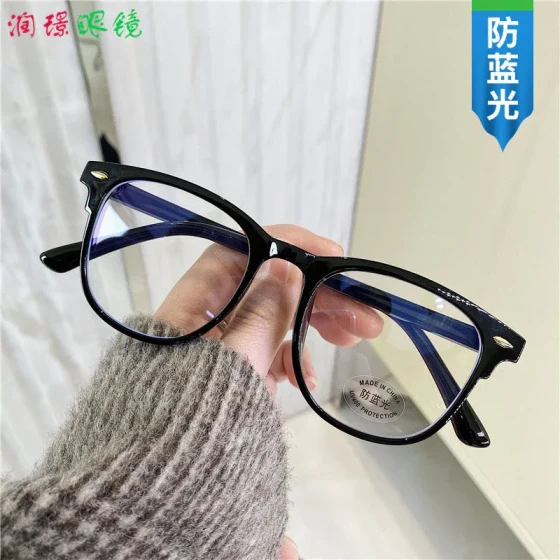 Popular European and American women's large-frame anti-blue light glasses with rivet details, simple retro commuter style, trendy plain lenses